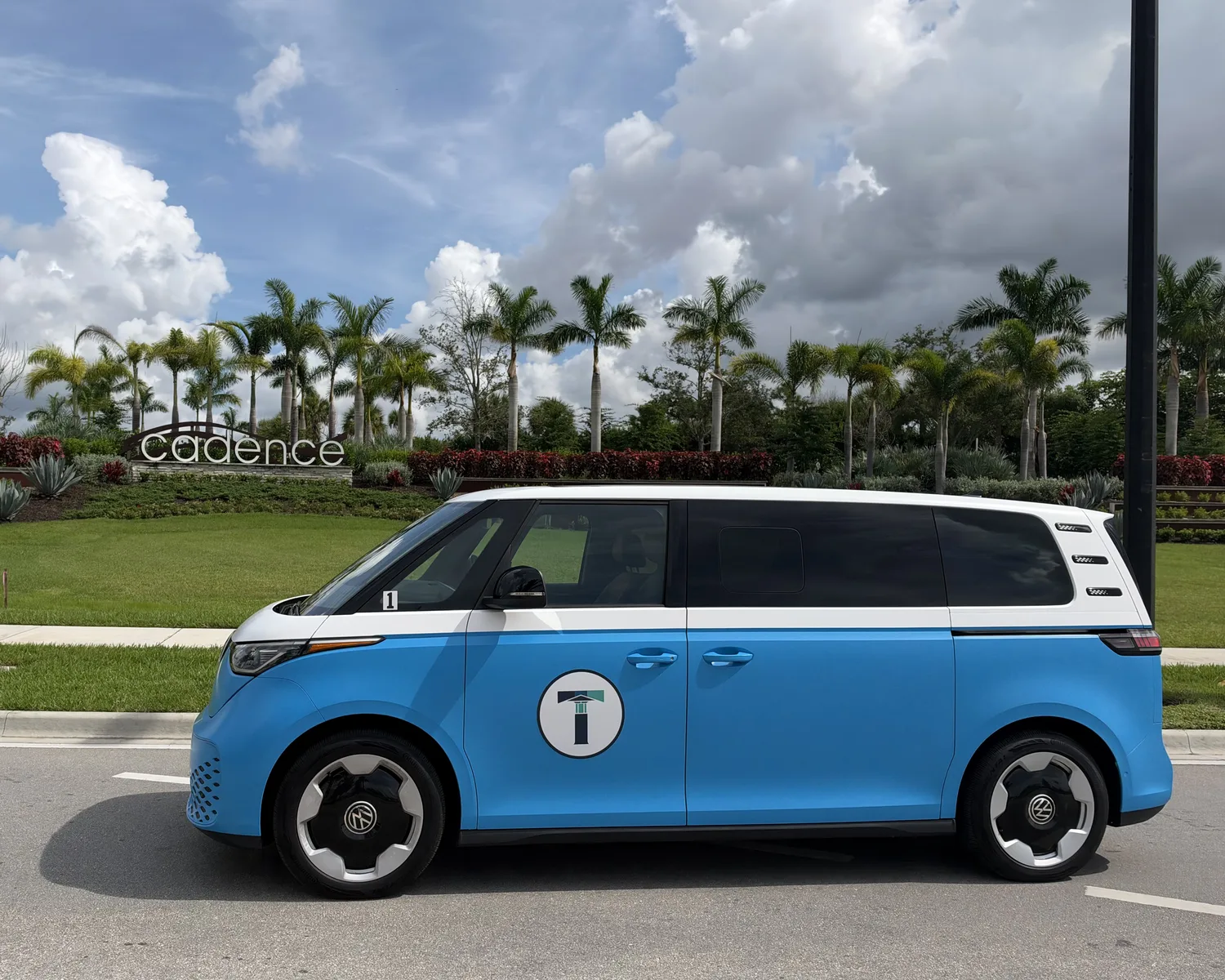 TIM Shuttle electric Volkswagen ID. Buzz in front of the Cadence neighborhood sign in Tradition, Port St. Lucie